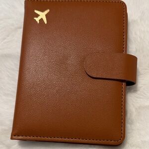 Brown Passport Holder with Gold Airplane
